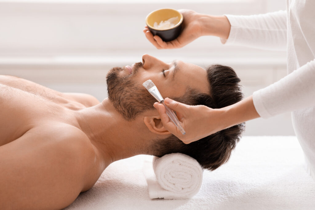 female attendant applying nourishing face mask on 2025 03 18 16 46 02 utc